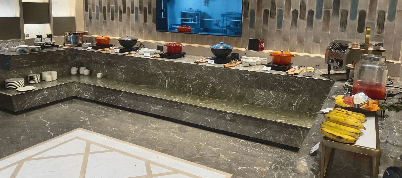 A vibrant buffet spread featuring a variety of dishes, desserts, and fresh fruits at  A vibrant buffet spread featuring a variety of dishes, desserts, and fresh fruits.